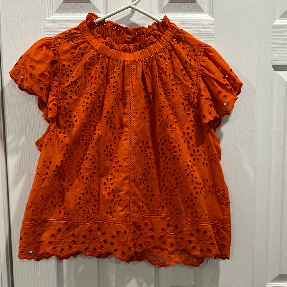 Orange eyelet crochet blouse